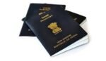 An Indian passport with UAE local address update process and guidelines for expatriates.