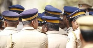 Police rescuing a young man attempting suicide on railway tracks in Thalassery