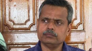 Dr. Harris Chirakkal speaking at a seminar criticizing the poor treatment facilities at Thiruvananthapuram Medical College