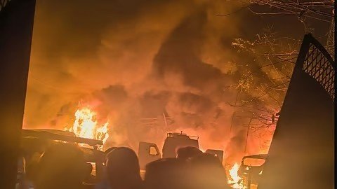 Debris and damaged police station building after a massive explosion at Naugam Police Station in Srinagar.
