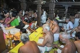 Devotees offering Dwadashipanam at Guruvayur Temple during Ekadashi completion ritual