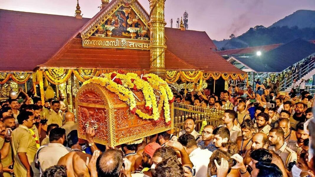 Close-up shot of Sabarimala Pathinettam Padi and the gold-plated sanctum sanctorum decorated with lamps.