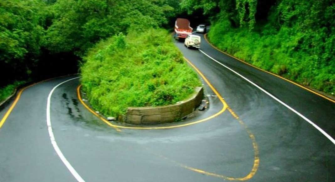 Traffic restrictions at Thamarassery Ghat as felled trees are loaded onto trucks during road widening works.