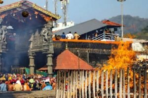 Traditional Thiruvabharanam procession being carried in a wooden box to Sabarimala temple for the Makaravilakku festival.