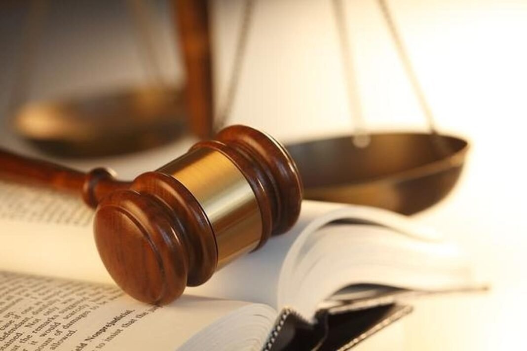 Gavel and scales of justice symbolizing the Delhi High Court's ruling on privacy and sexual consent.