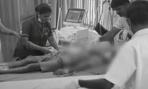 Medical monitor or a hospital bed symbolizing the treatment of an injured student following a school clash.