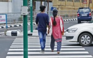 MVD Kerala officers inspecting road safety in civilian clothes; Zebra crossing safety rules Kerala.