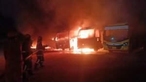 : View of charred remains of school buses at Trivandrum Scottish School premises after a late-night arson attack.