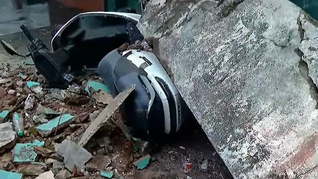 Emergency rescue teams clearing debris after a building collapse in Kozhikode Valiyangadi where four people died.