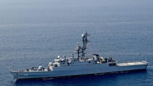 Graphic image showing Iranian Frigate IRIS Dena and naval tension map in Indian Ocean.