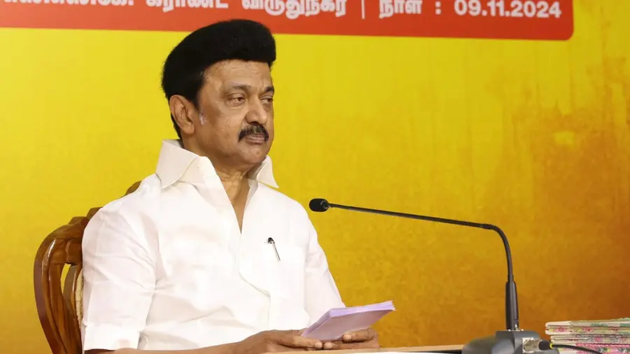 A collage of MK Stalin, Udhayanidhi Stalin, and O Panneerselvam against the backdrop of the DMK party flag.