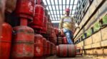 Industrial LPG cylinders stacked at a distribution center for commercial use.