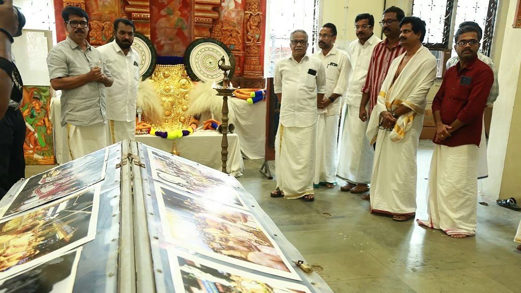 A display of the rare Alila Kannan mural painting and cultural photographs at the Guruvayur Temple mural study center exhibition.