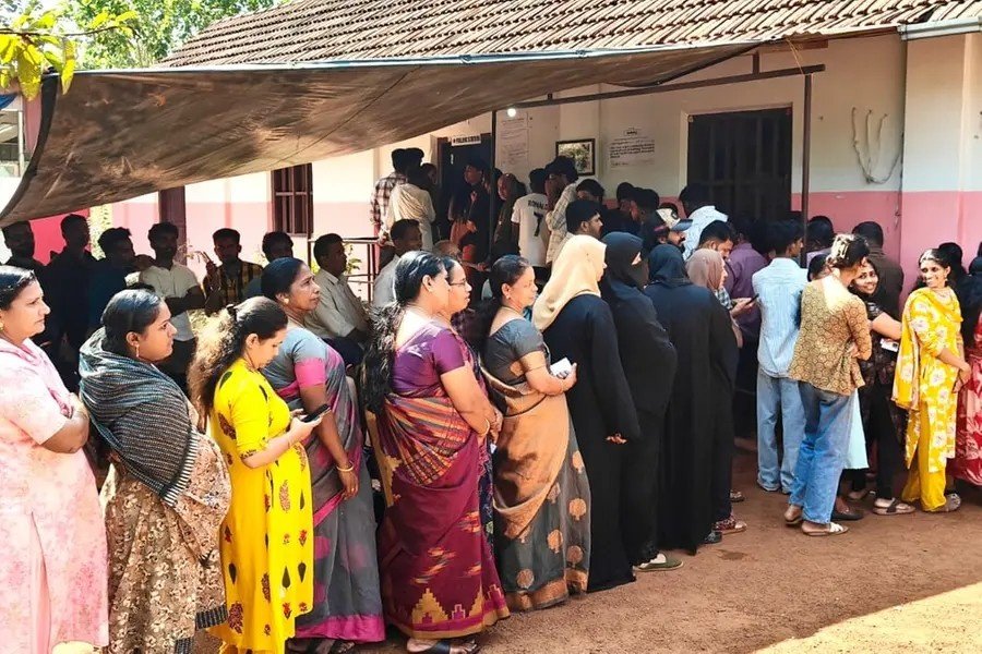 Actor Mohanlal showing his inked finger after voting at a polling booth in Thiruvananthapuram.