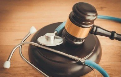 Legal gavel and stethoscope representing the High Court ruling on Kerala nursing strike.