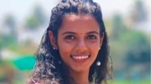 Rescuers working near a crashed auto-rickshaw and a broken electric post in Alappuzha.